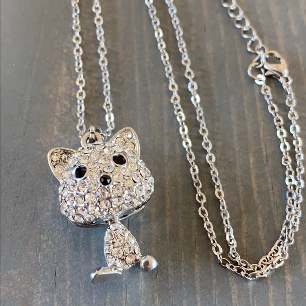 Crystal kitty moving head long necklace. Brand new